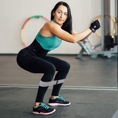 elastique musculation multiforce femme fait squat